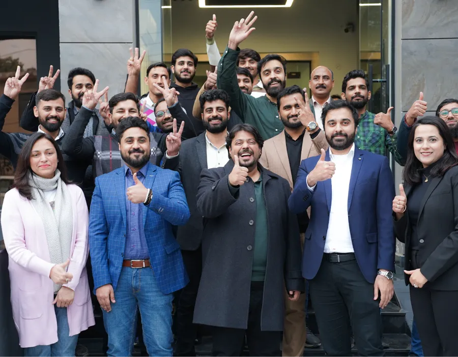 The Codedistrict team standing together outside the office