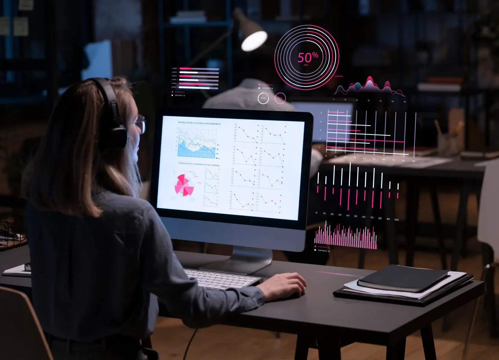 Developer analyzing software audit reports and metrics on a data dashboard.